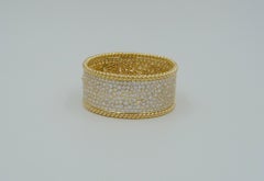 Bracciale con diamanti in oro 18k e 40 carati di diamanti bianchi con dettaglio a corda ritorta