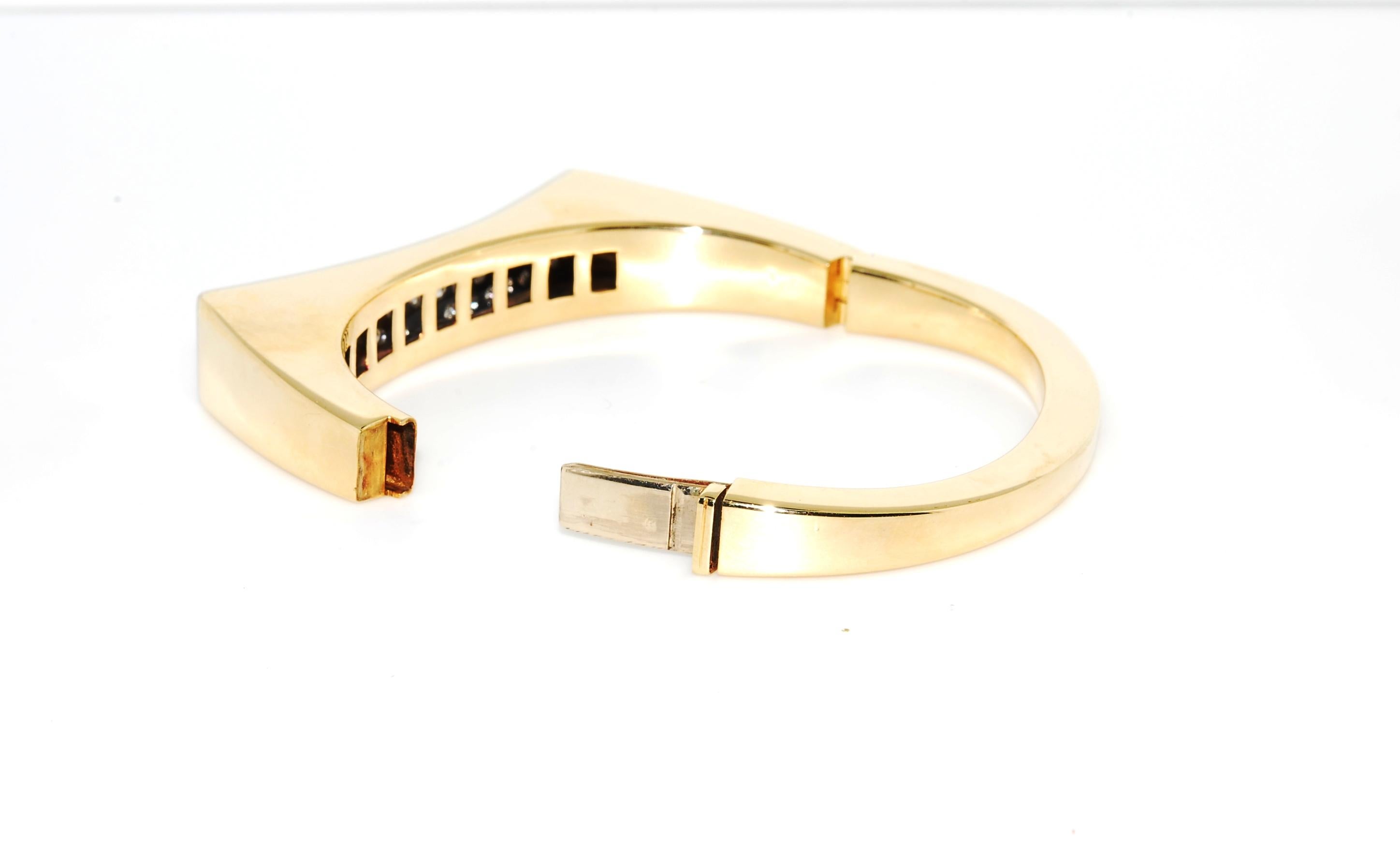 Classy  Italian 14 karat yellow gold concave shape cuff bracelet. Contains 50 round diamonds 4-prong set each in 3 rows. Very secure clasp. Retro and timeless style. Almost 4 carats makes a statement - yet understated. Simply elegant and radiates