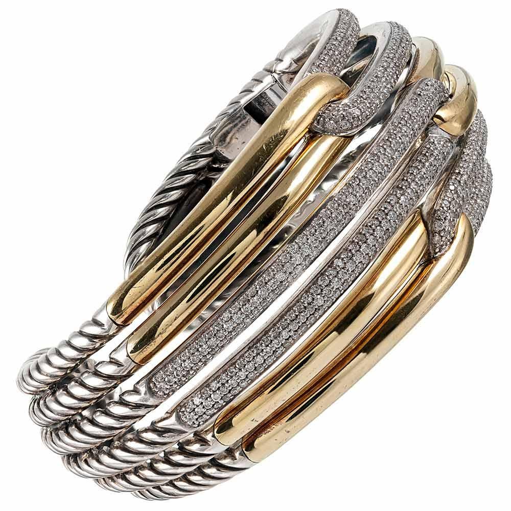 Contemporary glamour is fused with David Yurman’s iconic and recognizable aesthetic with this sharp design. The cuff measures 1 1/8 inches wide at the widest and tapers at its back side for comfort. The woven design is rendered in stainless steel