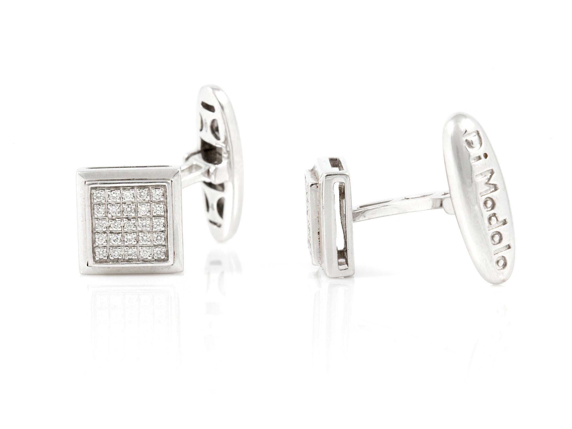 Cufflinks finely crafted in 18k white gold with diamonds weighing a total of 0.80 carat.