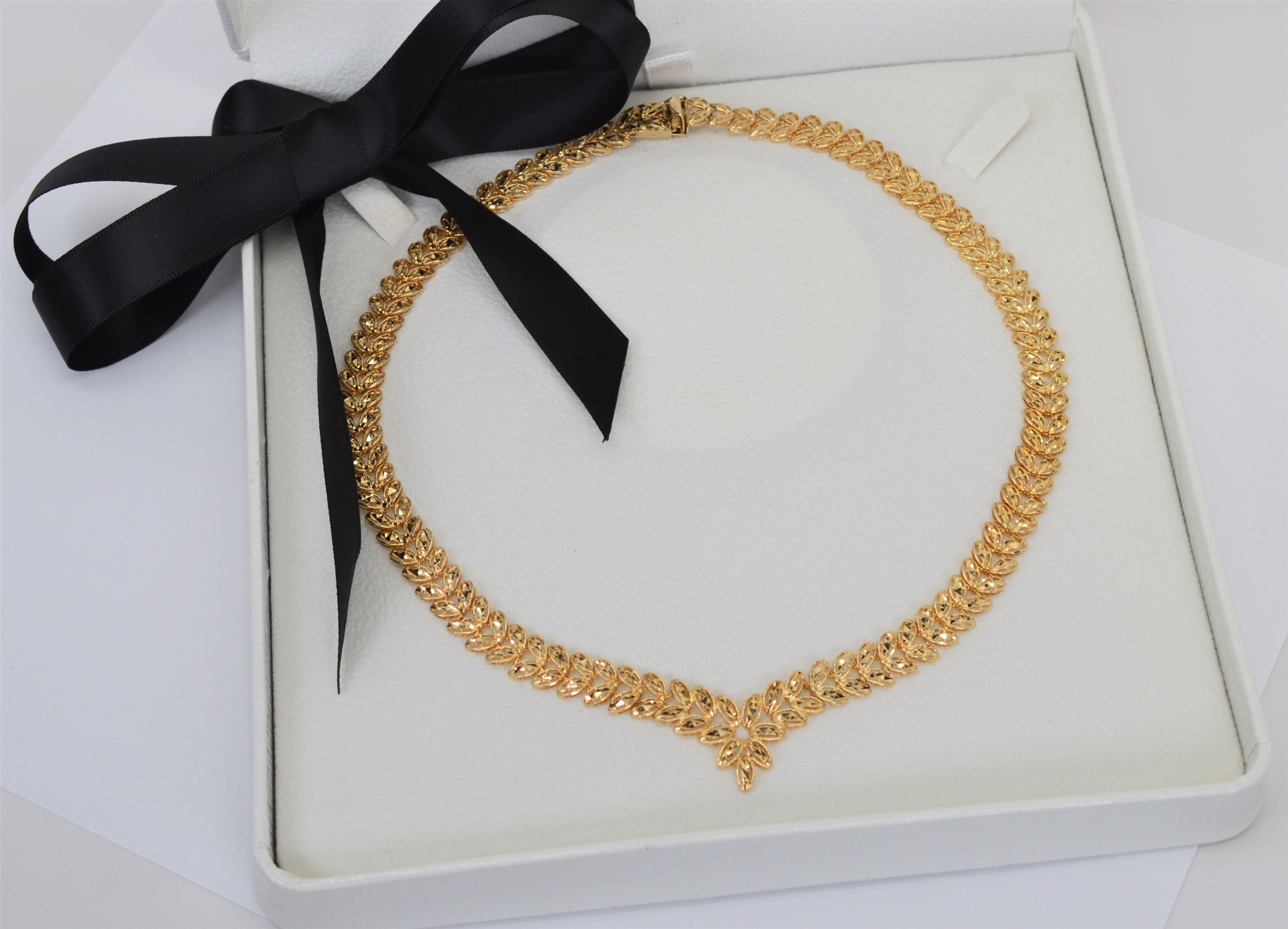 Women's Diamond Cut 14 Karat Yellow Gold Chevron Leaf Portrait Necklace For Sale