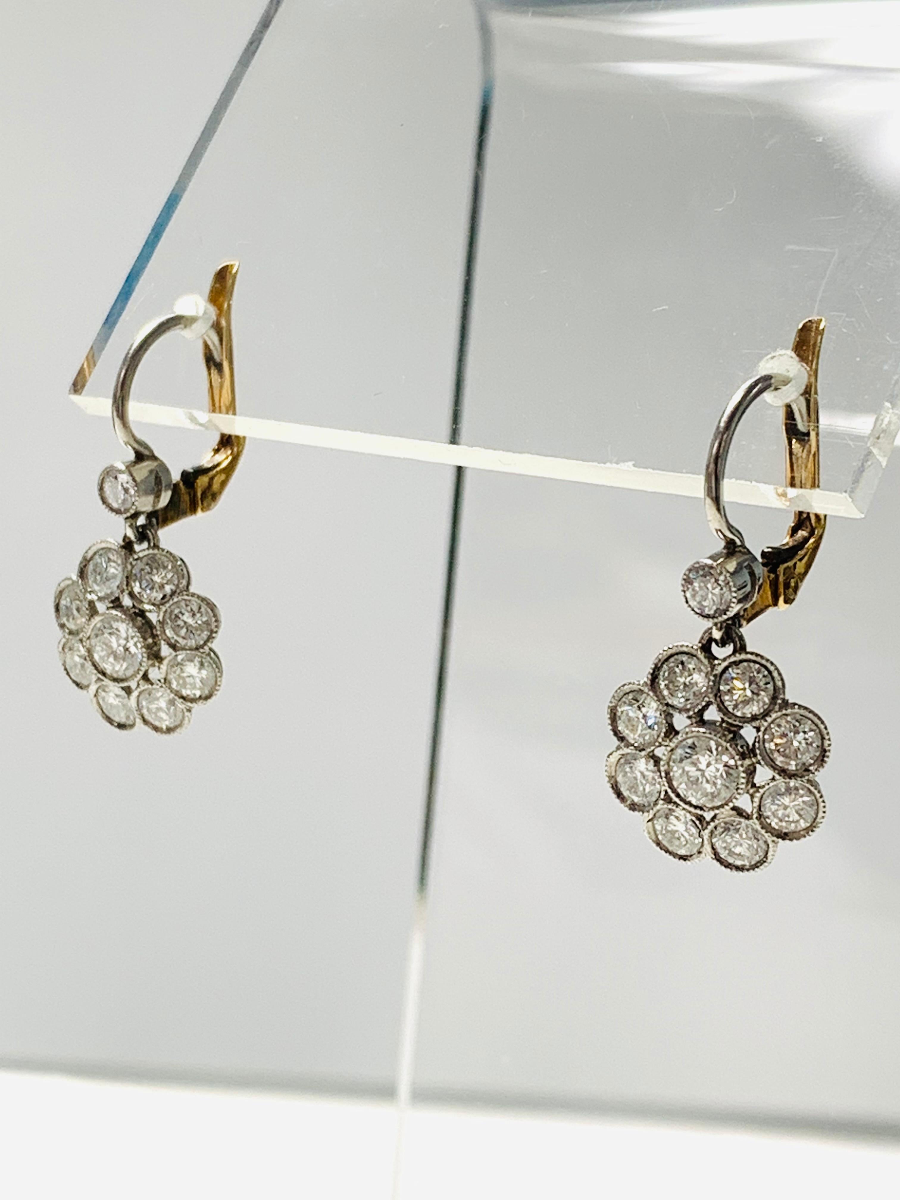 Diamond Dangle Earring in Platinum and 18k Gold For Sale 1