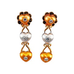 Pendants d'oreilles en or jaune 18 carats avec diamants