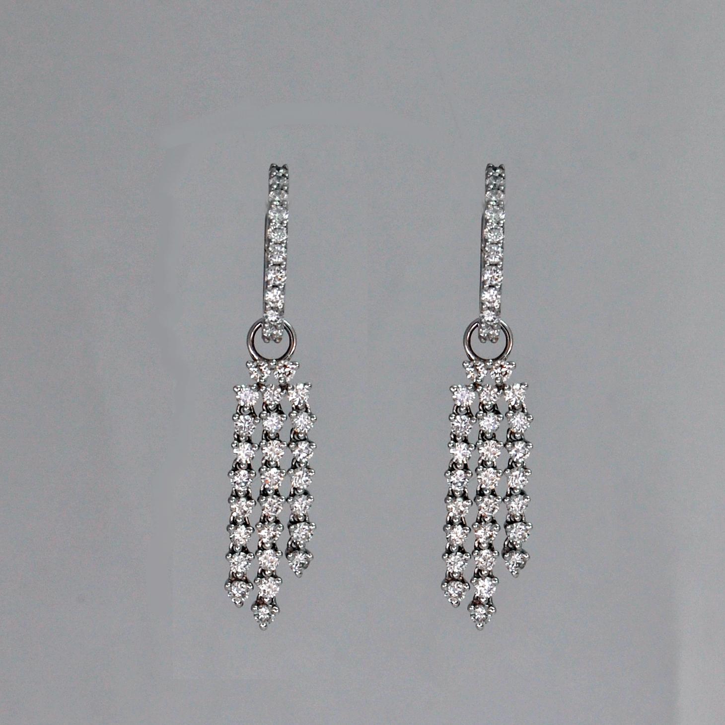 Beautiful diamond dangle drop earrings, chandelier / waterfall style, in 18 karat white gold created by Orostar. The drop parts easily come off and you can use them as huggie earrings. These charming women's earrings are available in stock.
* Metal: