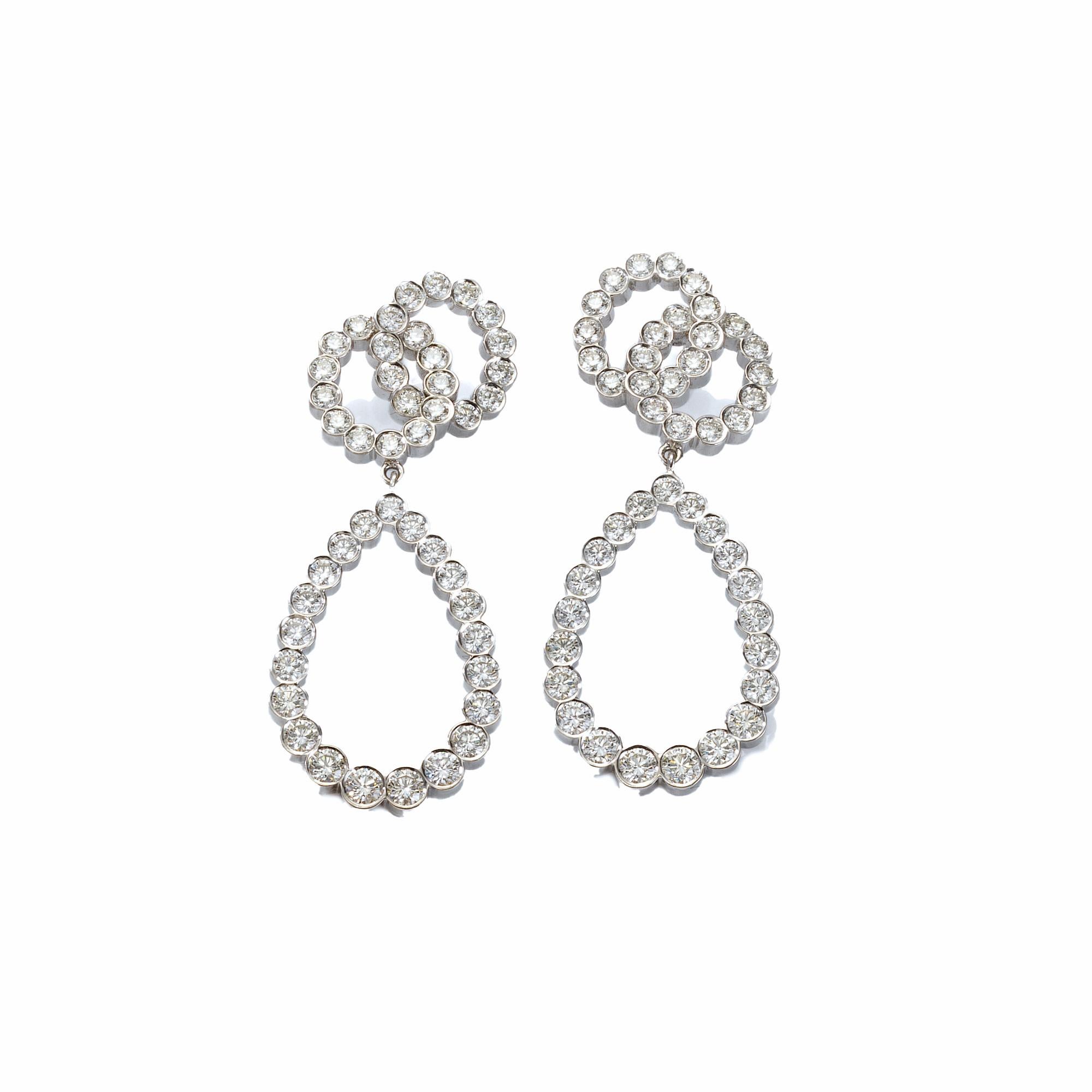 90 Round Brilliant Cut Diamonds a total of 4.98 carats set in 18k white gold dangle earrings.
Also available in rose gold.
