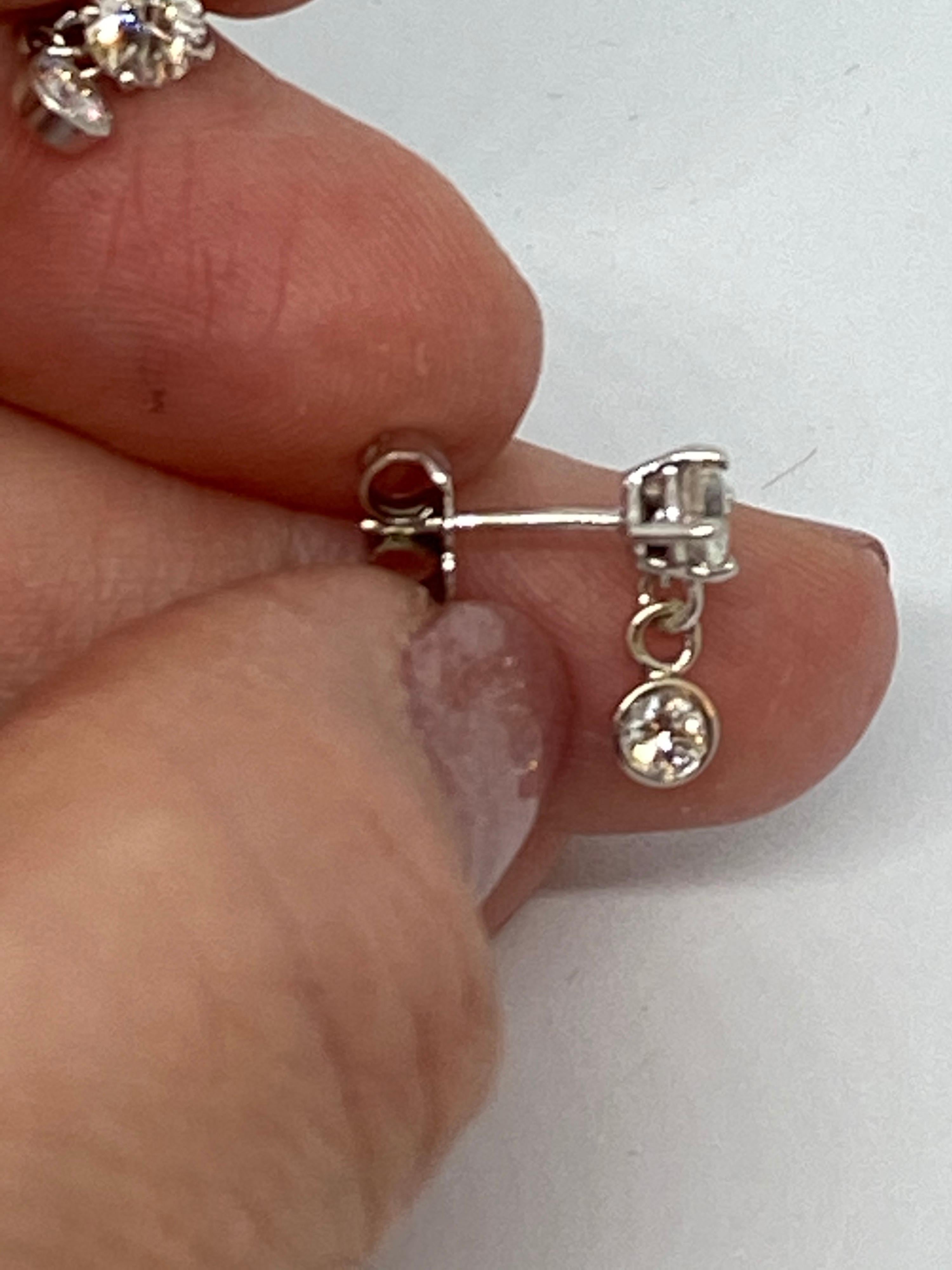 Round Cut Diamond Dangle Earrings in 14 Karat Gold Weighing 0.80 Carat For Sale