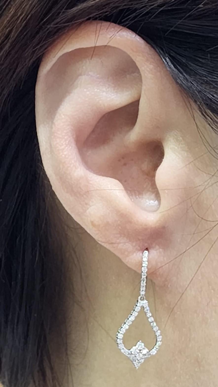 Women's Diamond Dangle Earrings in 18 Karat White Gold For Sale