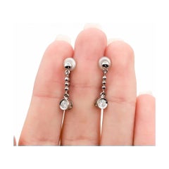 Diamond Dangle Earrings in Platinum