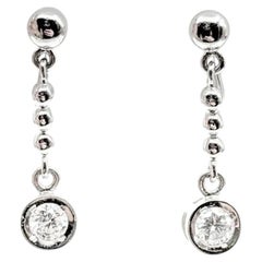 Diamond Dangle Earrings in Platinum
