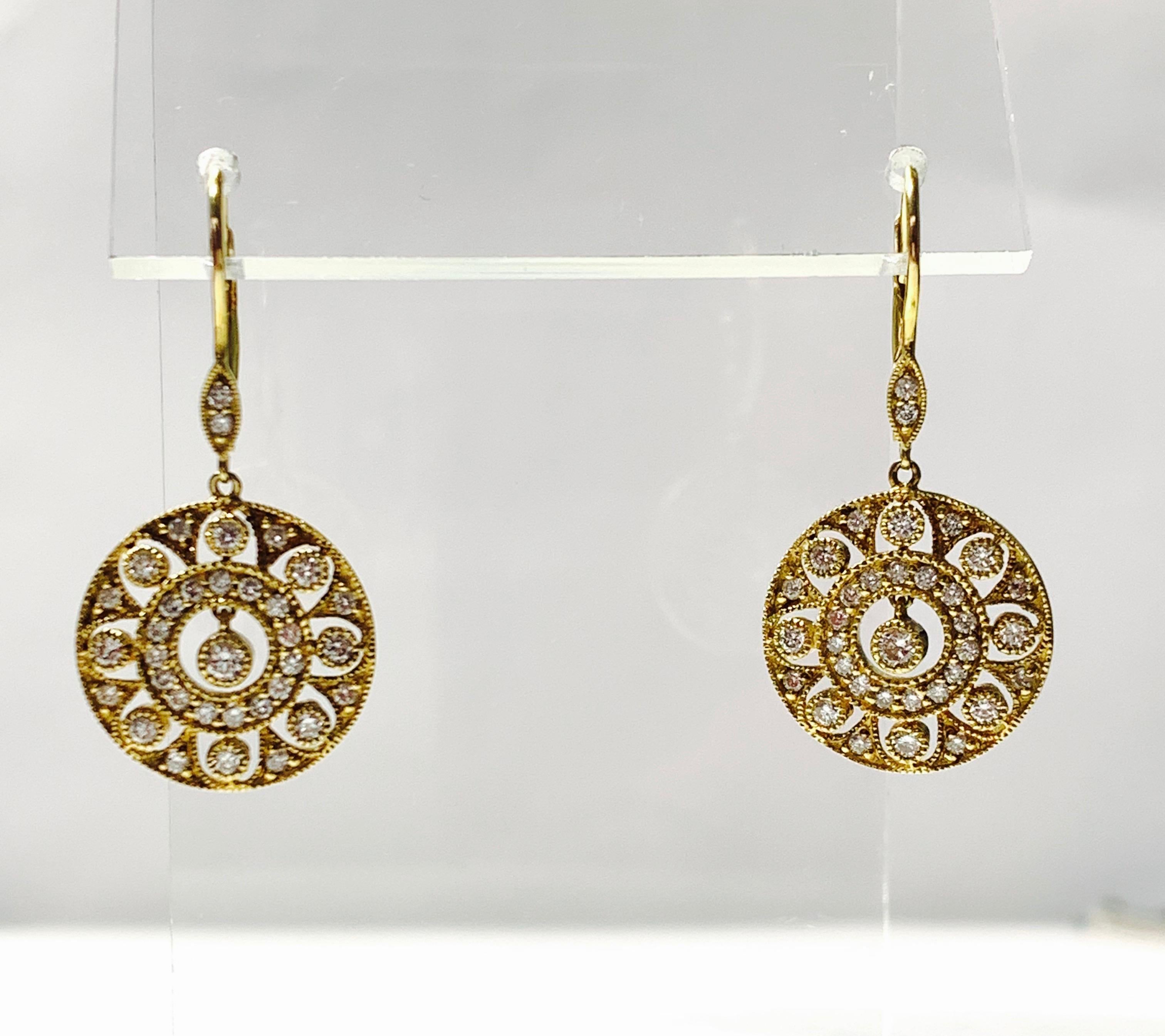 Round Cut Diamond Dangle Earrings in Yellow Gold For Sale