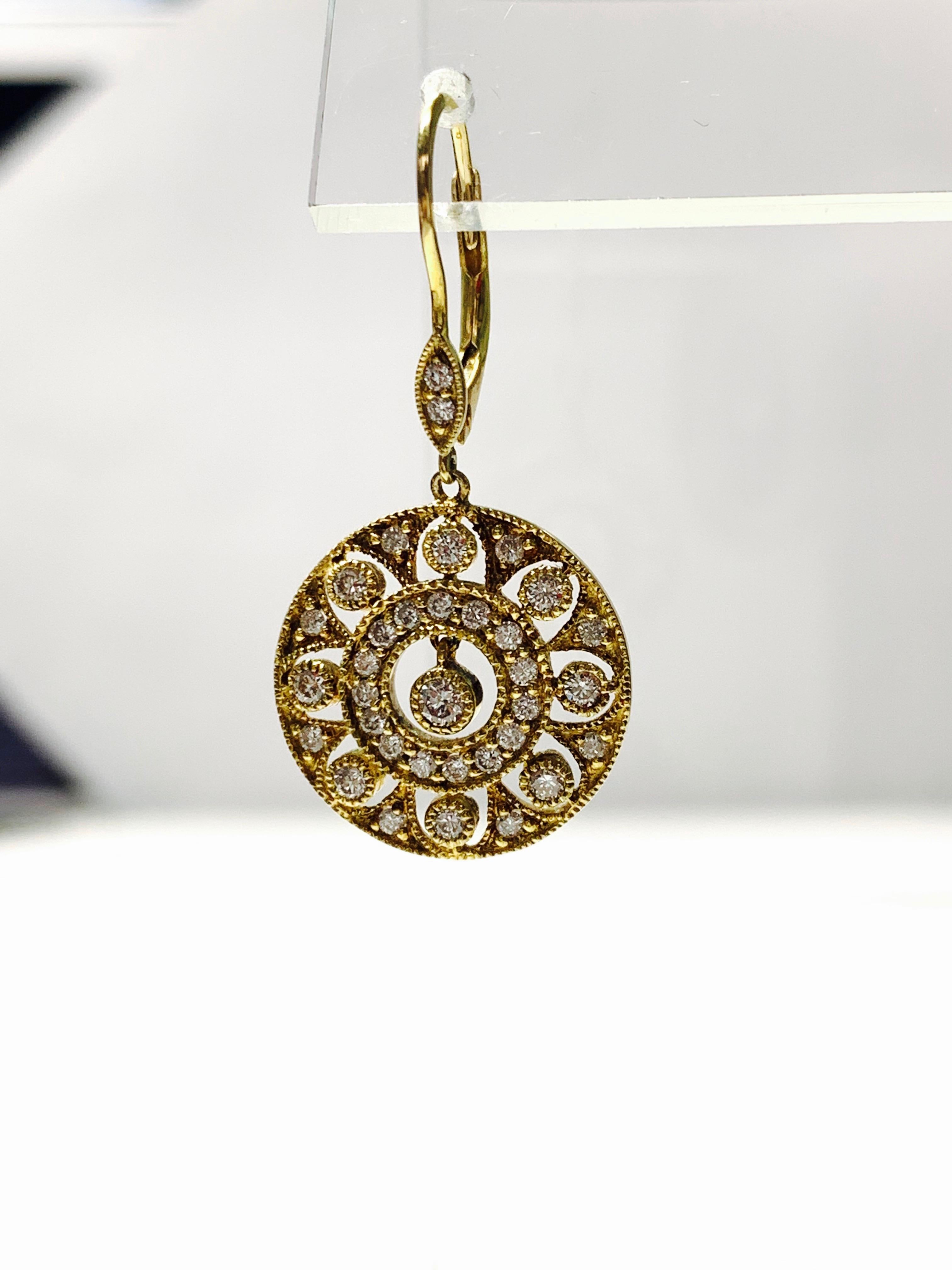 Diamond Dangle Earrings in Yellow Gold For Sale 2