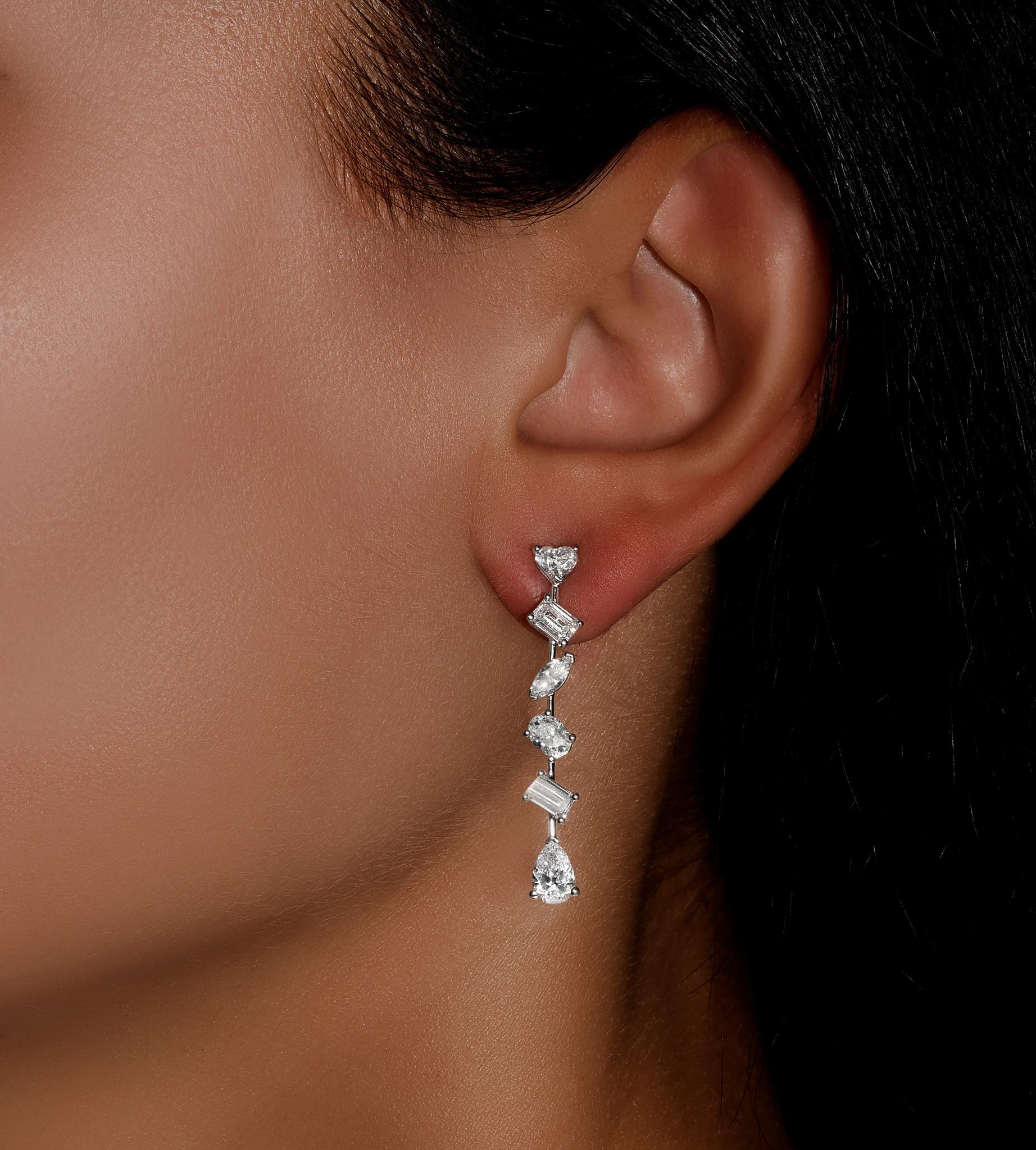 It comes with the Gemological Appraisal by GIA GG/AJP
All Gemstones are Natural
12 Diamonds = 3.62 Carats
Cut: Heart, Pear, Emerald, Marquise
Metal: 18K White Gold