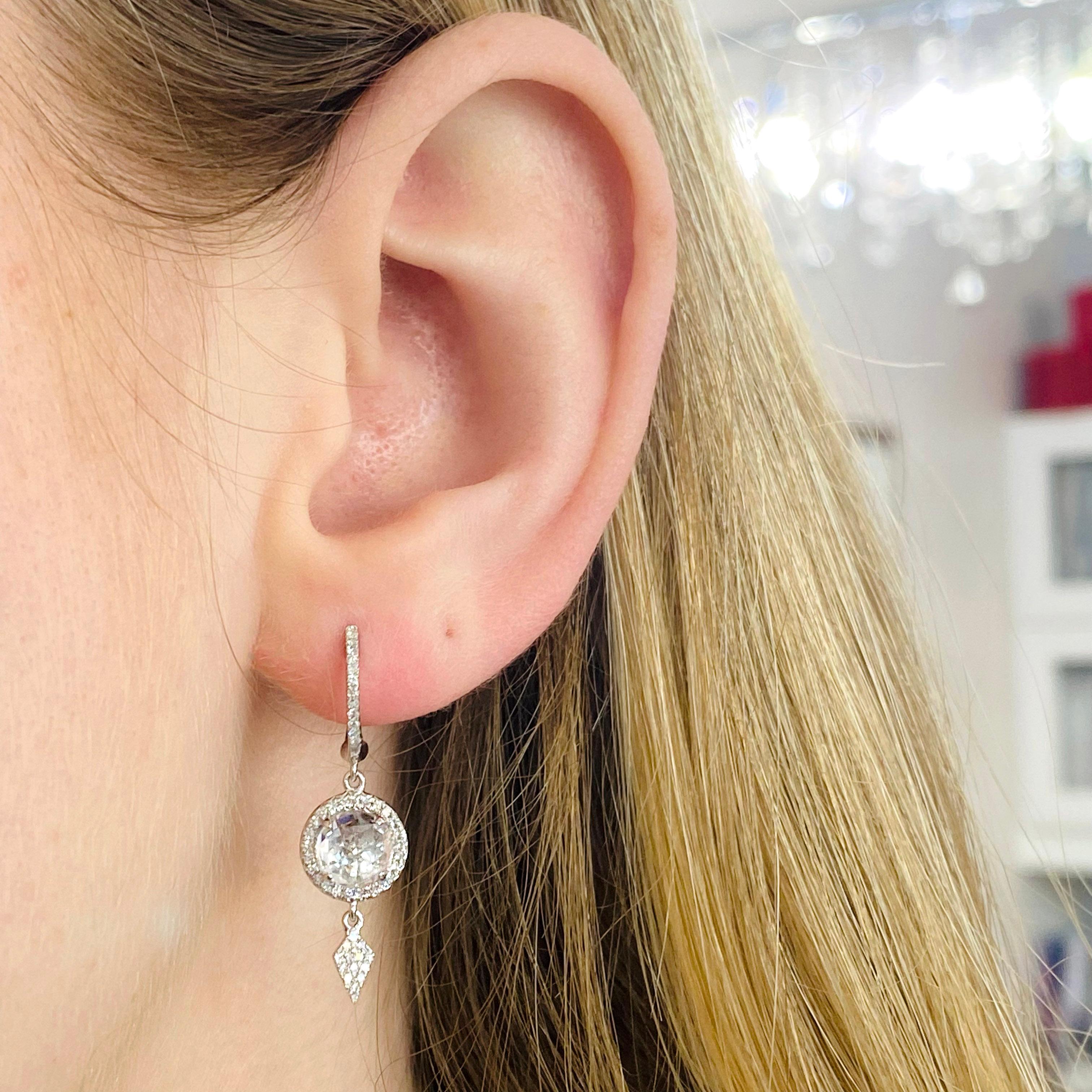These diamond dangle earrings are super versatile, from jeans to dressy or even for your wedding earrings!  Each earring is made in 3 parts so it has movement as your head and body move. This glorious feature makes it our number one diamond earrings
