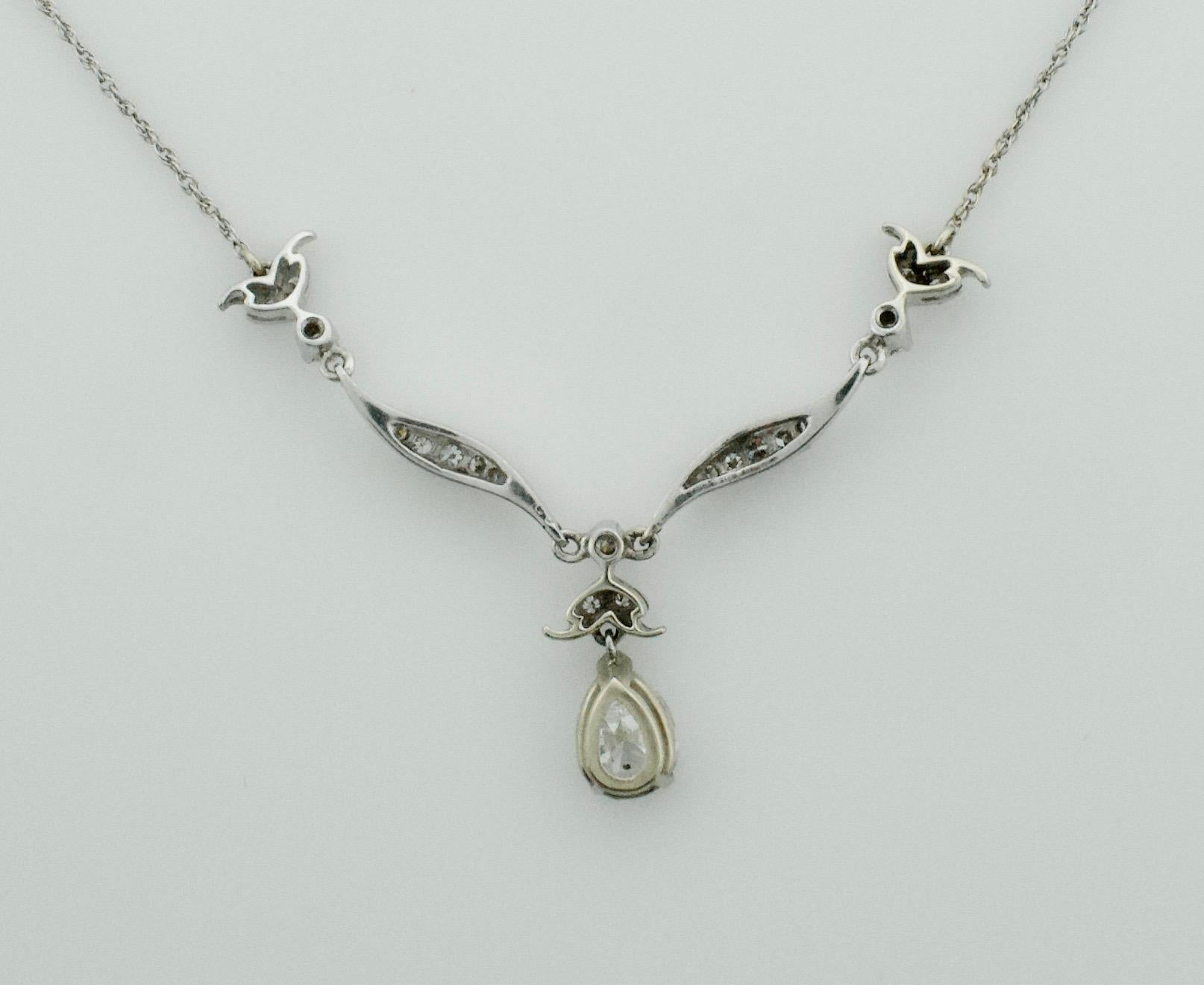 Pear Cut Diamond Dangling Diamond Pear Shape Necklace in Platinum on 14 Karat Chain For Sale
