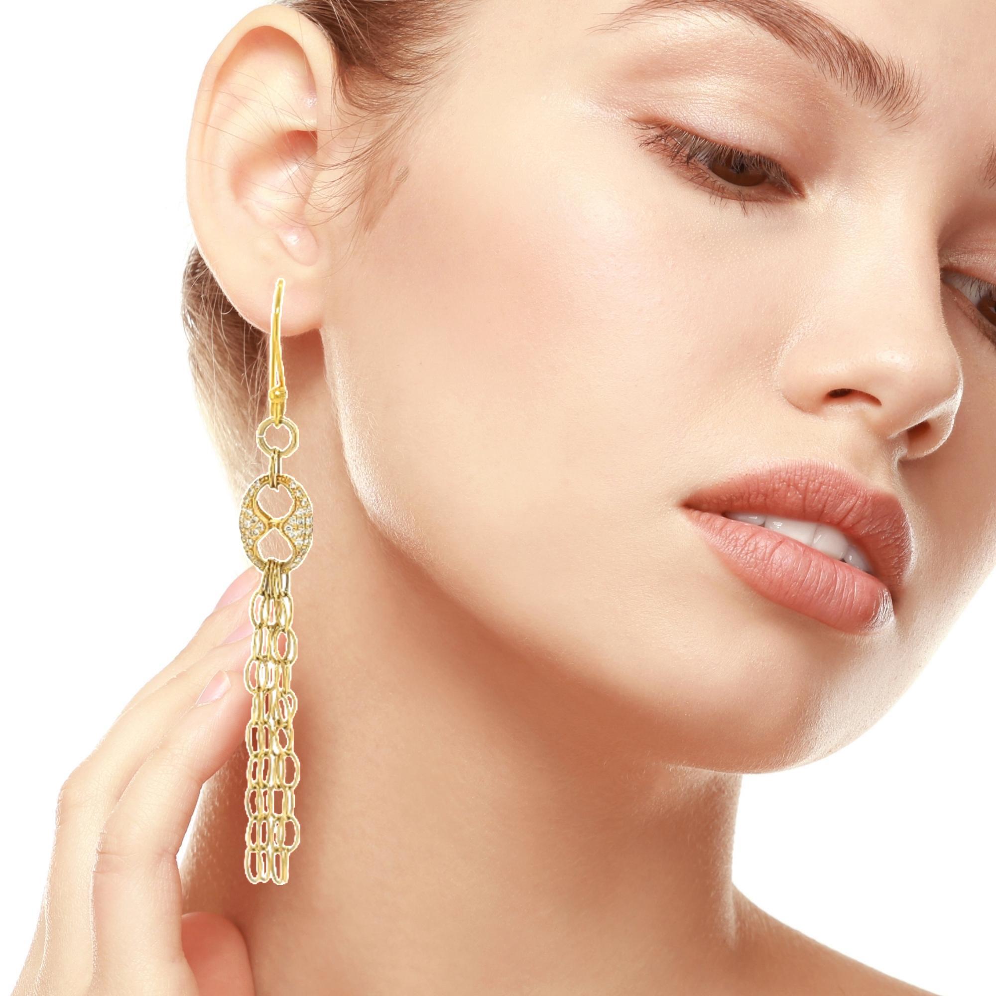 These delicate and stunning diamond earrings are perfect for that special dinner or event. They can be worn with your casual jeans or cocktail dress. They have 80 round diamonds all set in 18karat yellow gold. They have a fish hook closure for easy