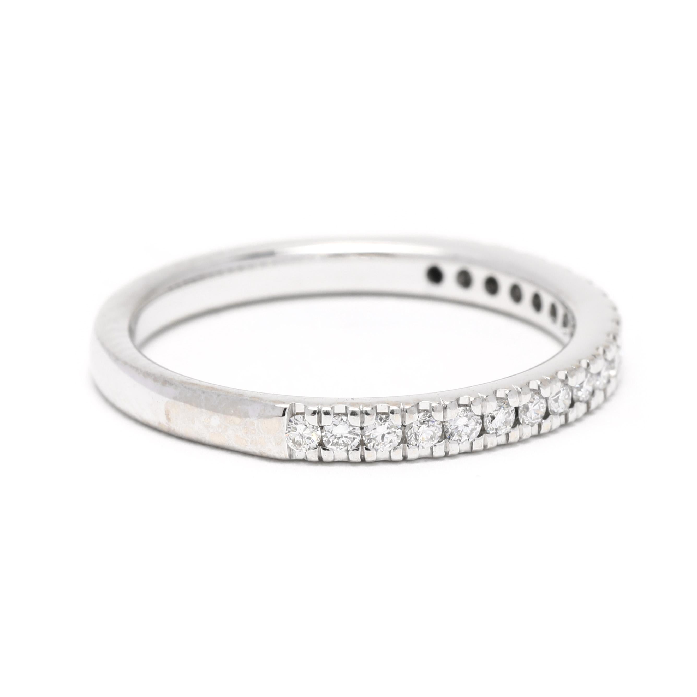 This delicate 0.30ctw diamond wedding band is perfect for the modern bride. Crafted from 14K white gold, this thin diamond band is stackable and features 0.30 ctw of round brilliant diamonds. The ideal wedding ring for the minimalist bride, this