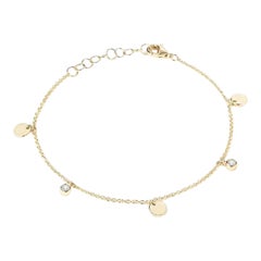 Bracelet en or jaune 14K avec breloque en forme de disque de diamant