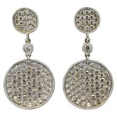 Pendientes de gota de oro con disco de diamantes