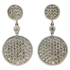 Boucles d'oreilles pendantes en or avec disques de diamants