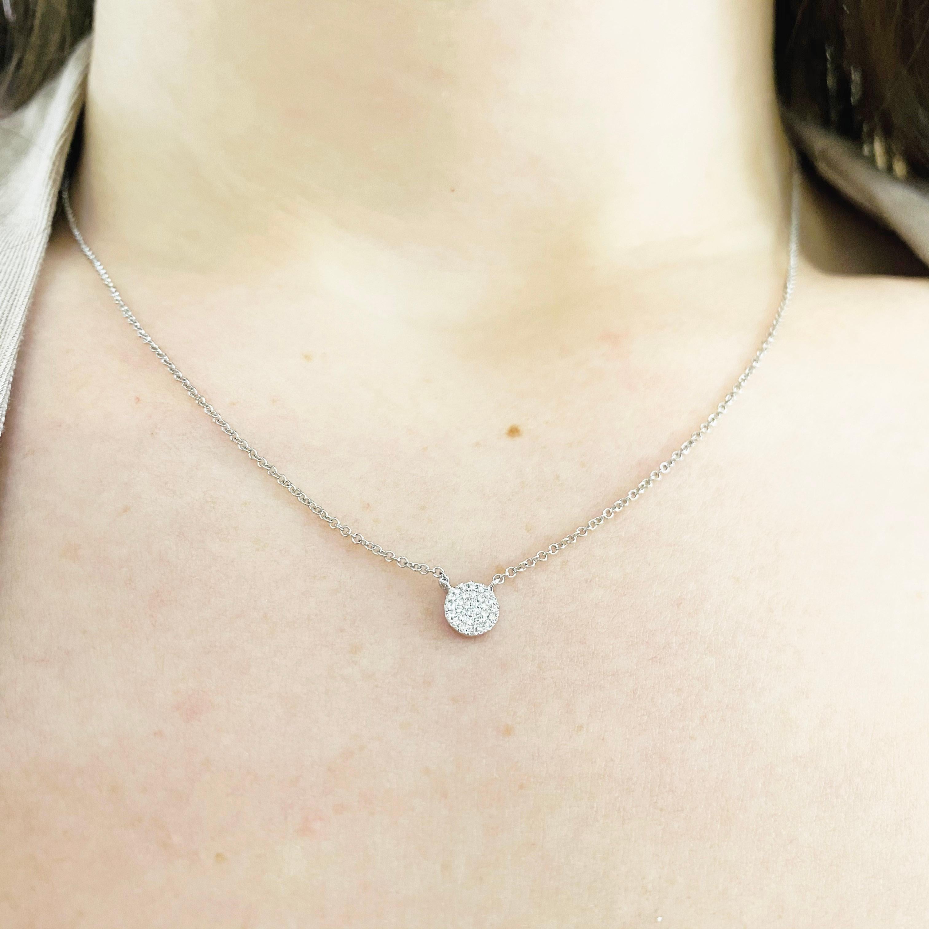 This gorgeous 14k white gold disk pendant with pave diamonds is sure to put a smile on anyone's face! This necklace looks beautiful worn by itself and also looks wonderful in a necklace stack. This necklace would make a wonderful gift for your loved