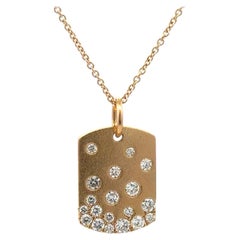 Collana con ciondolo con coriandoli di diamanti 0,73 carati in oro giallo 14 carati
