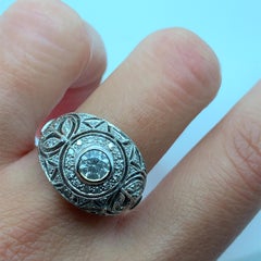 Diamond dome antique engagement ring in 18k white gold