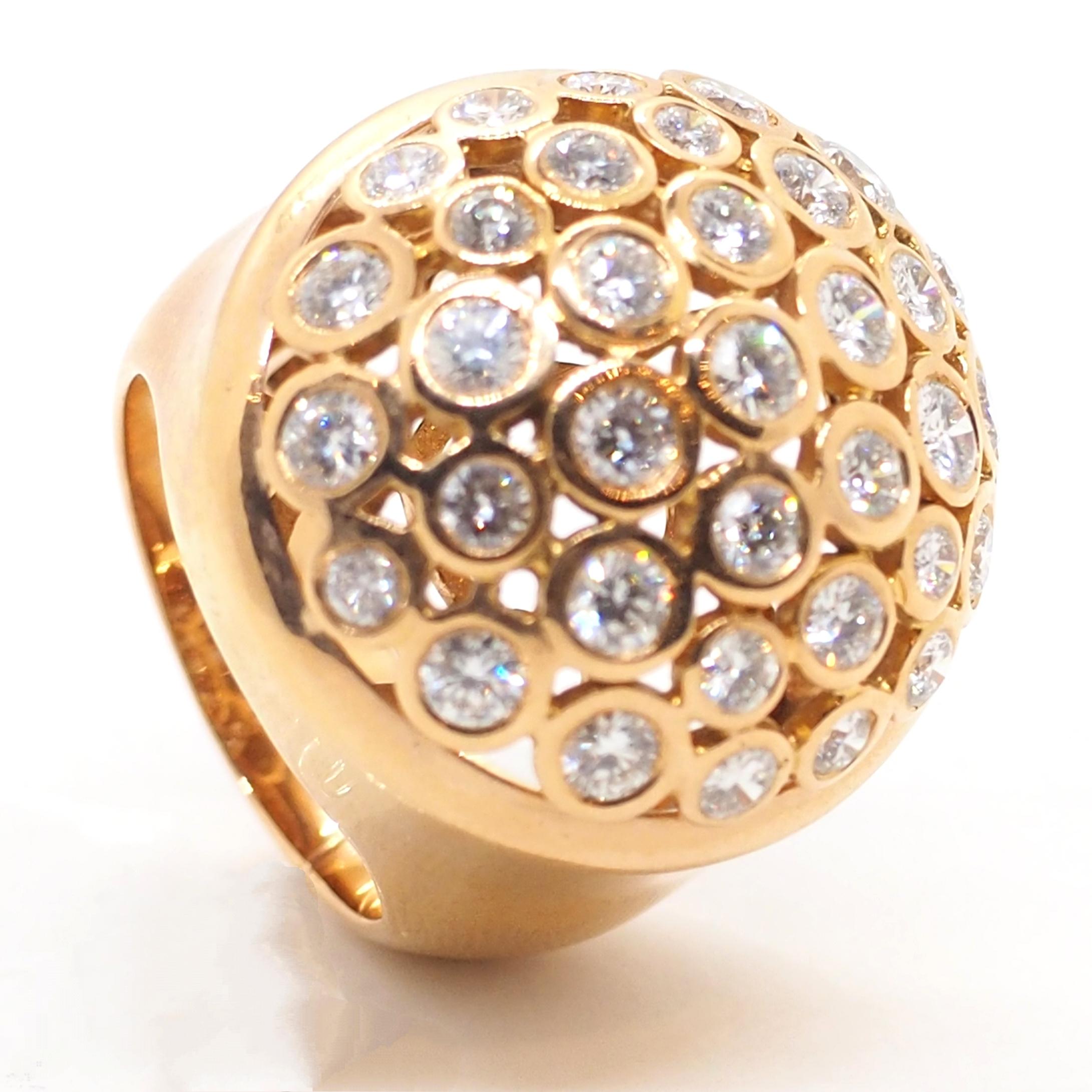 A beautiful dome ring crafted in 18 Karat rose gold. The ring features round-cut brilliant diamonds with an approximate weight 3 carats. The simple and elegant design makes this ring suitable for the daytime, but it's shiny diamonds and a big size