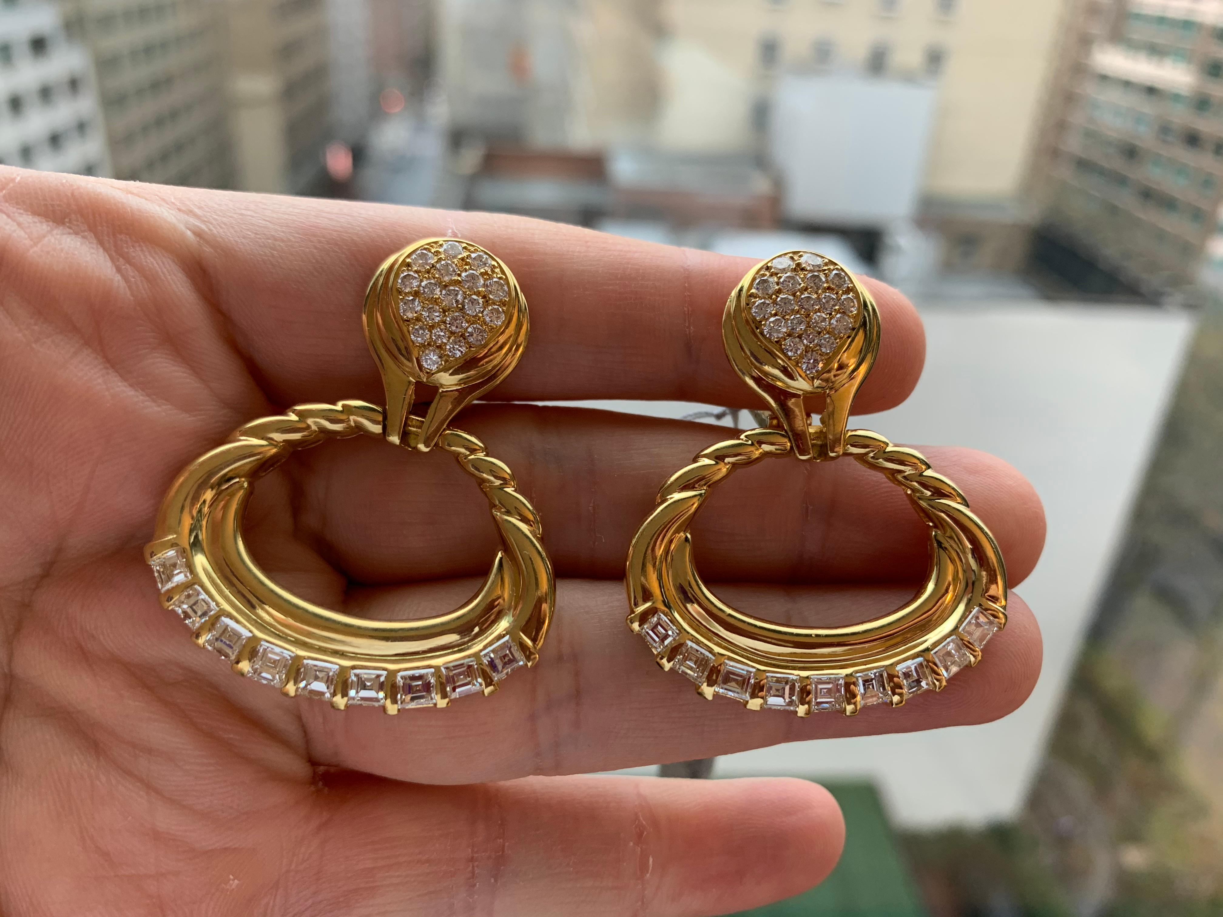 Diamond Door Knocker Earrings

Approx:
3.29 ct Baguette Diamonds
1.33 round diamonds 

18 Karat Gold
