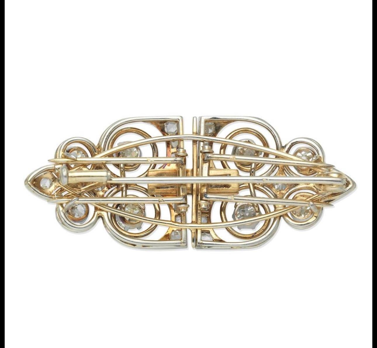 DIAMOND DOUBLE-CLIP BROOCH
Cushion-shaped and rose-cut diamonds
Cushion-shaped diamonds approx. 2.65cts total
French assay marks
Length 5.6cm
Weight approx. 18.5g
Footnotes:
French assay marks (owl) partially struck to pin and clip fittings.