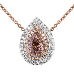 Diamond Double halo pendant with Fancy Pink Diamond