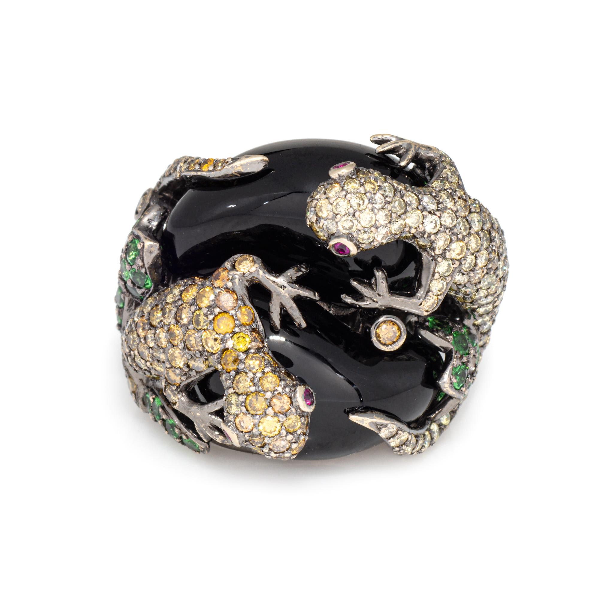 Distinct & stylish contemporary lizard ring crafted in 18 karat blackened white gold (circa 2000s). 

Round brilliant cut diamonds are set into the lizards and total an estimated 1.50 carats (estimated at L-M color and SI1-I1 clarity). Small 1mm to