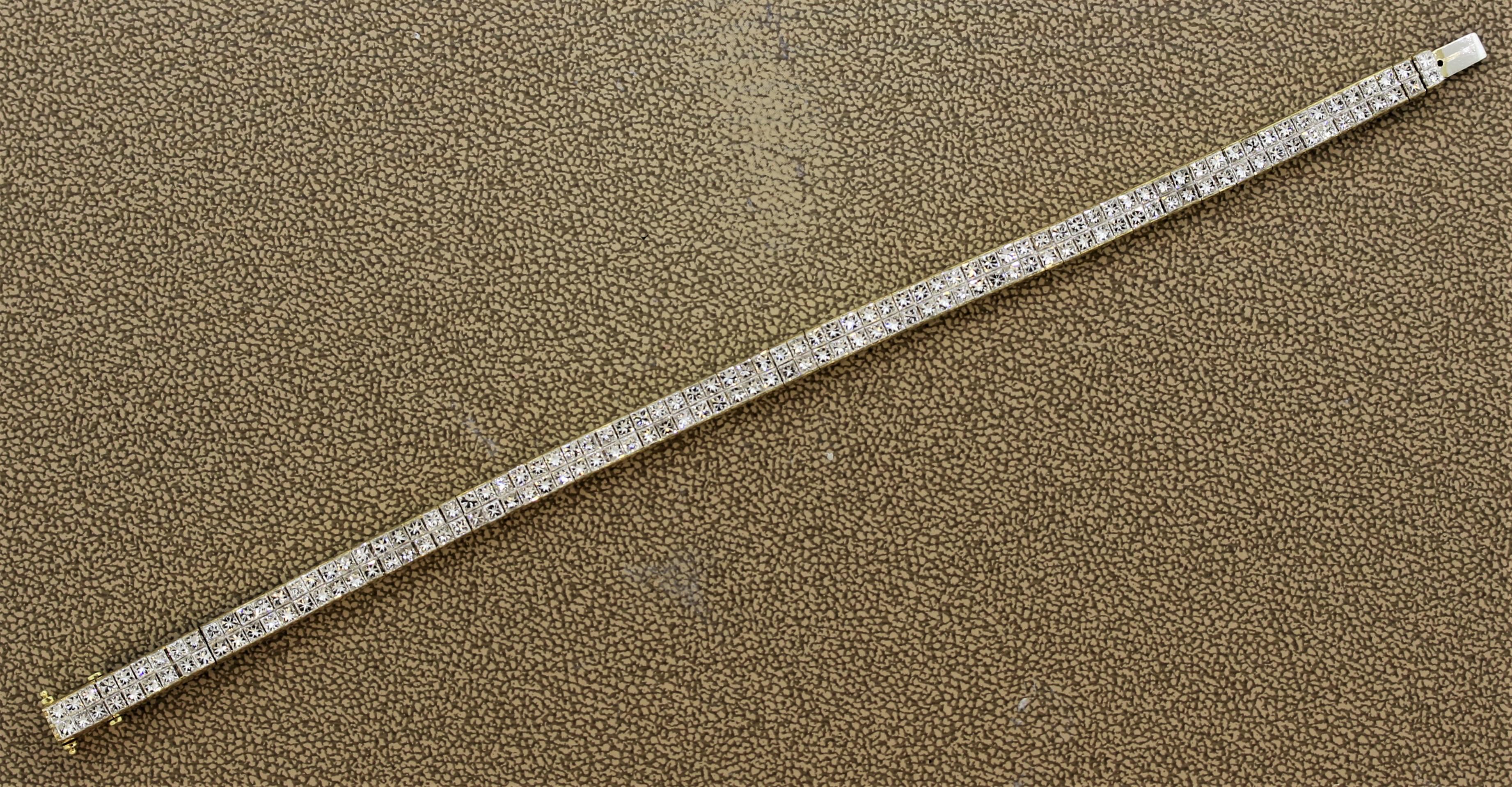 A classic tennis bracelet featuring 10 carats of princess cut diamonds. They are set in two rows using the famed “invisible setting” style. Made in 18k yellow gold and can be worn everyday.

Length: 7.25 inches