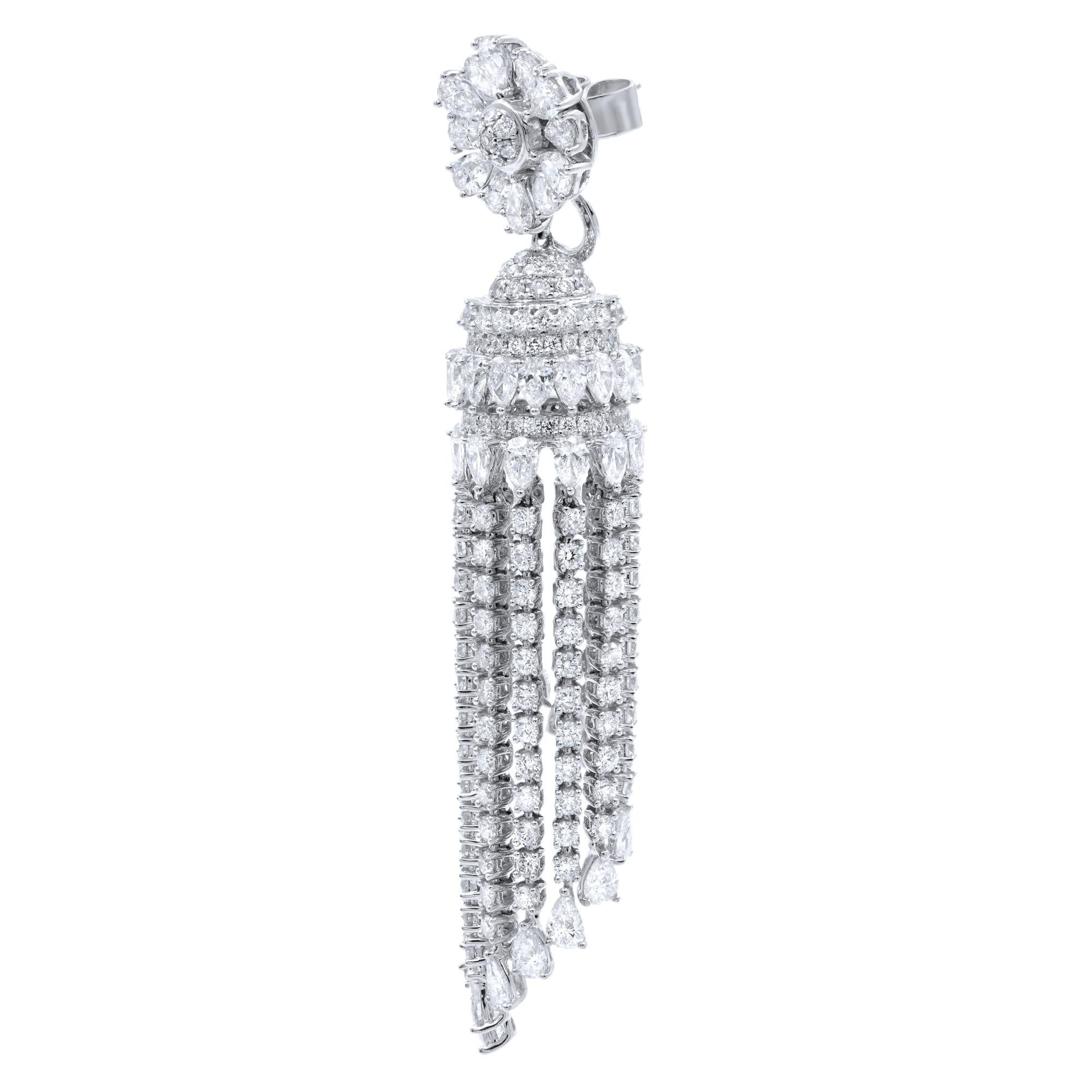 Ladies diamond drop earrings crafted in 18K White Gold. Beautiful diamond earrings are 2 inches long, make a statement outfit look complete. Make a grand entrance whenever you walk in the room wearing these fabulous absolutely stunning pair of