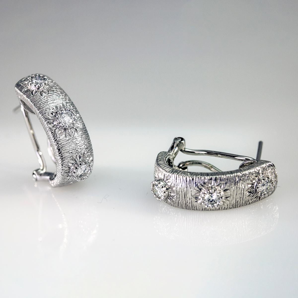 Artfully created by Orostar. These elegant women's earrings are available in stock.
* Metal: 14 karat white gold
* Gold Weight: 8.3 grams
* Stones: Natural Diamonds
* Diamonds Weight: .60 carats
* Diamond Color Grade:  G-H
* Diamond Clarity Grade: