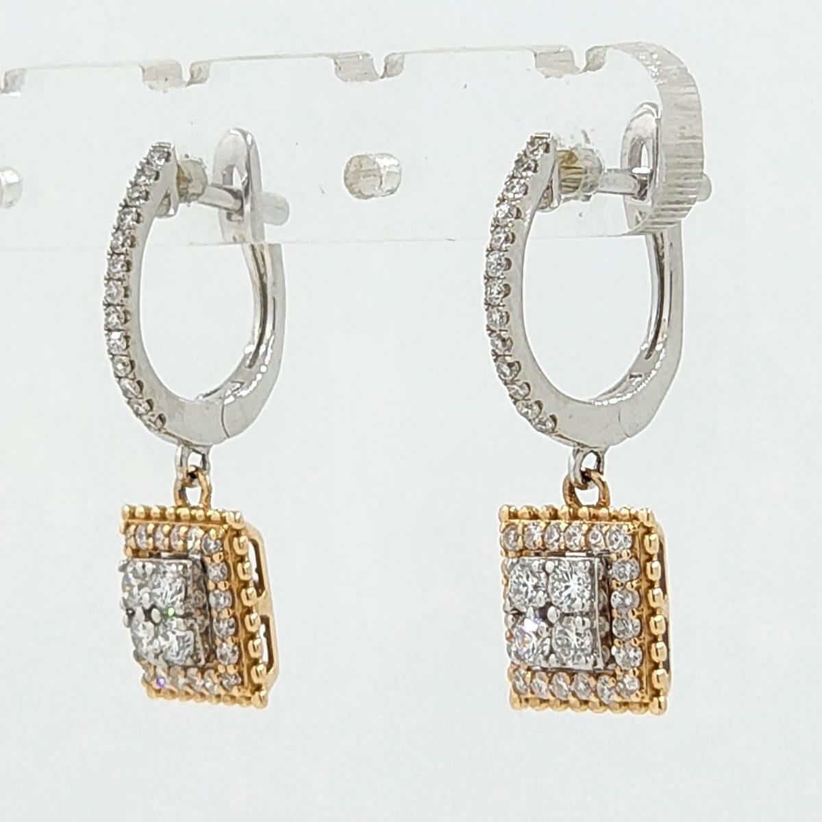 Introducing our Timeless 0.73ct Diamond Drop Earrings in 18 Karat White and Yellow Gold, a magnificent blend of classic beauty and contemporary design. These exquisite earrings exude elegance and sophistication, making them a timeless addition to