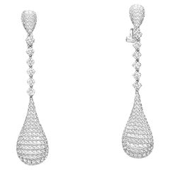 Boucles d'oreilles pendantes en or blanc 18 carats avec diamants