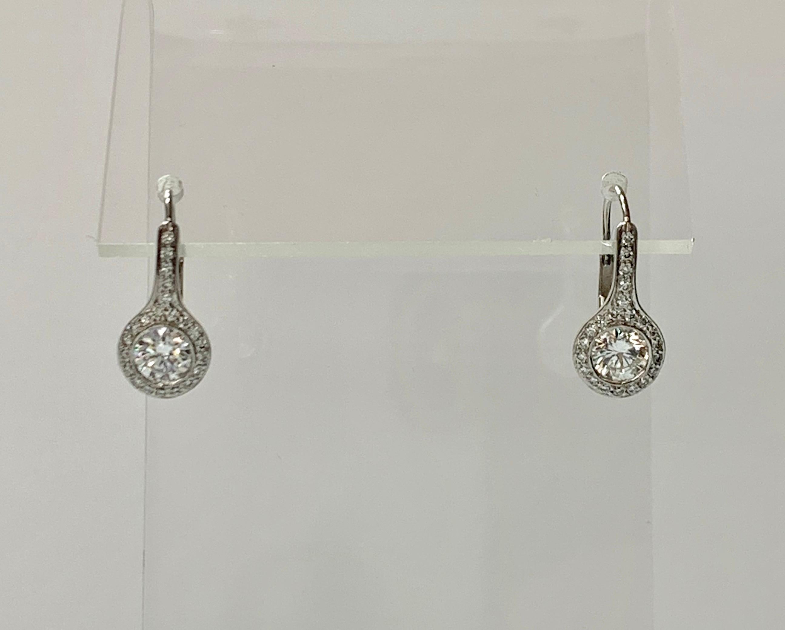 Diamond drop earrings beautifully handcrafted in platinum. 
The details are as follows : 
Diamond weight : 1.25 carat ( GH color and VS2 clarity ) 
Metal : platinum