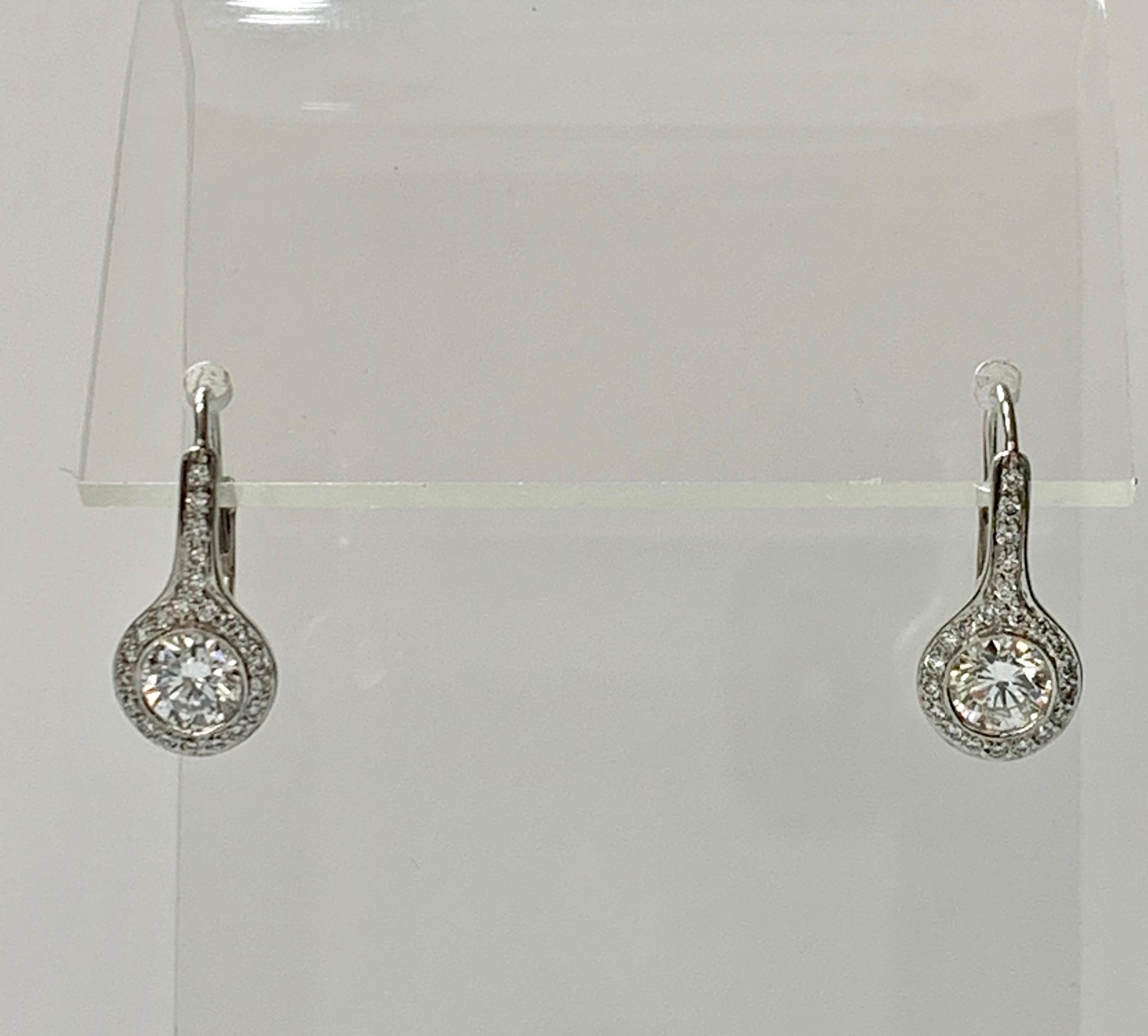 Contemporary Diamond Drop Earrings in Platinum For Sale