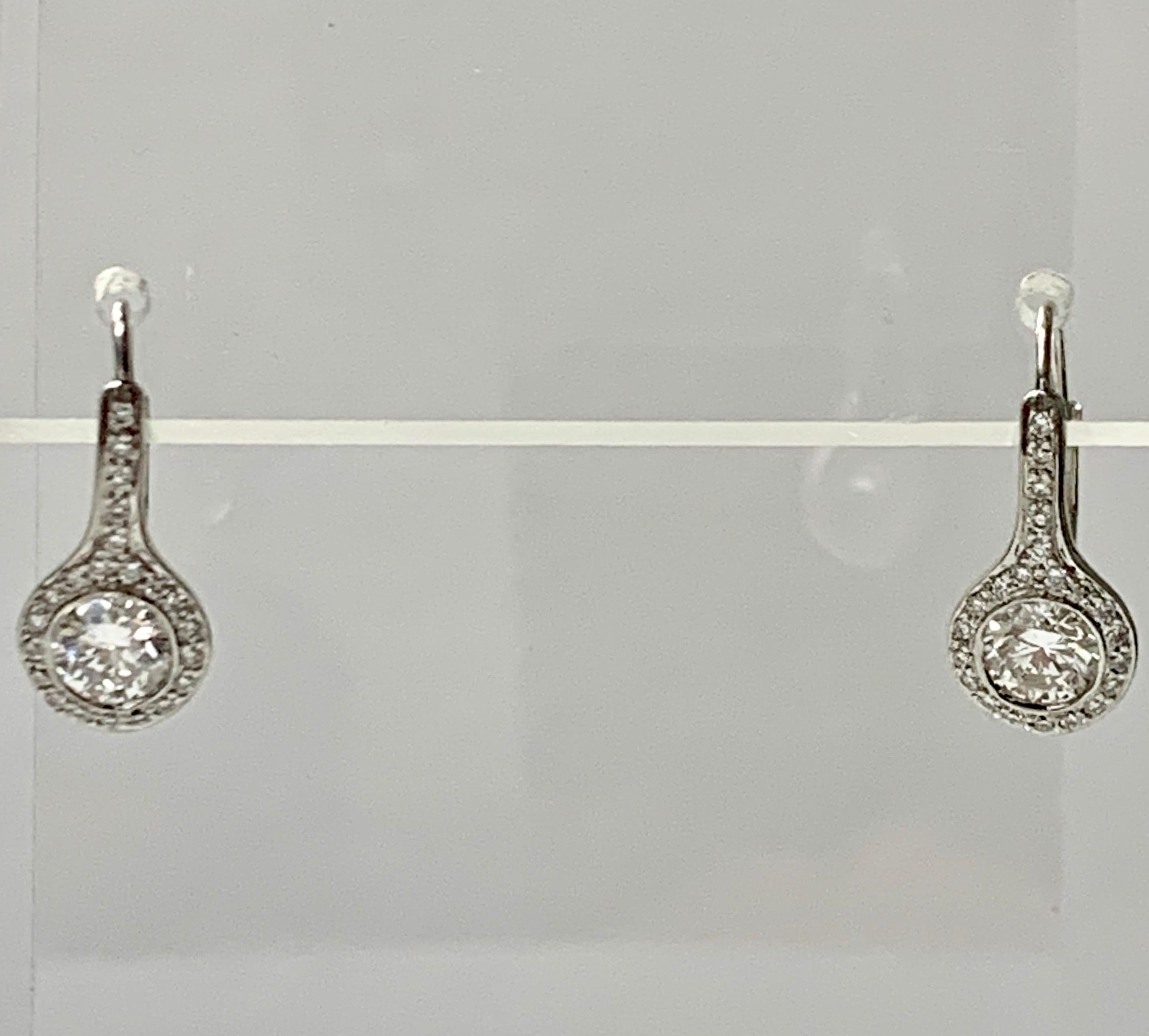 Women's Diamond Drop Earrings in Platinum For Sale