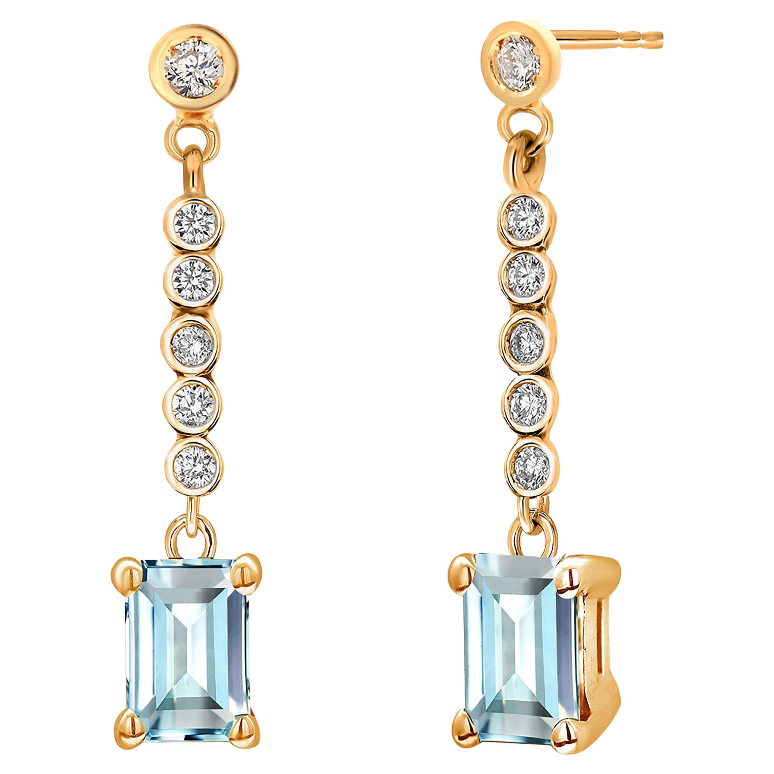 Orecchini a goccia con diamante e acquamarina a forma di smeraldo in oro giallo