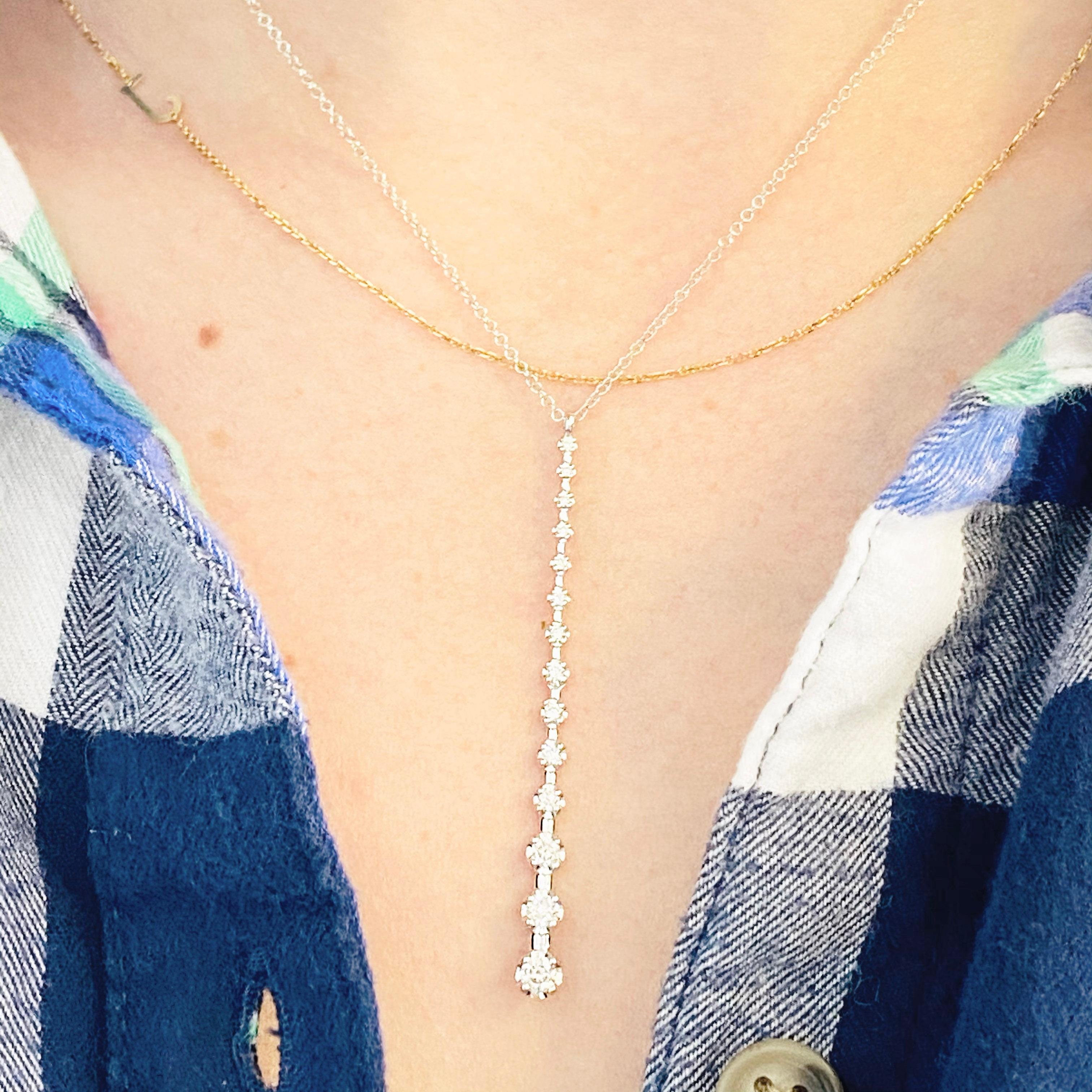 This stunningly sexy beautiful 14k white gold station bar pendant drop dripping with diamonds provides a look that is very modern yet classic! This necklace is very fashionable and can add a touch of style to any outfit, yet it is also classy enough