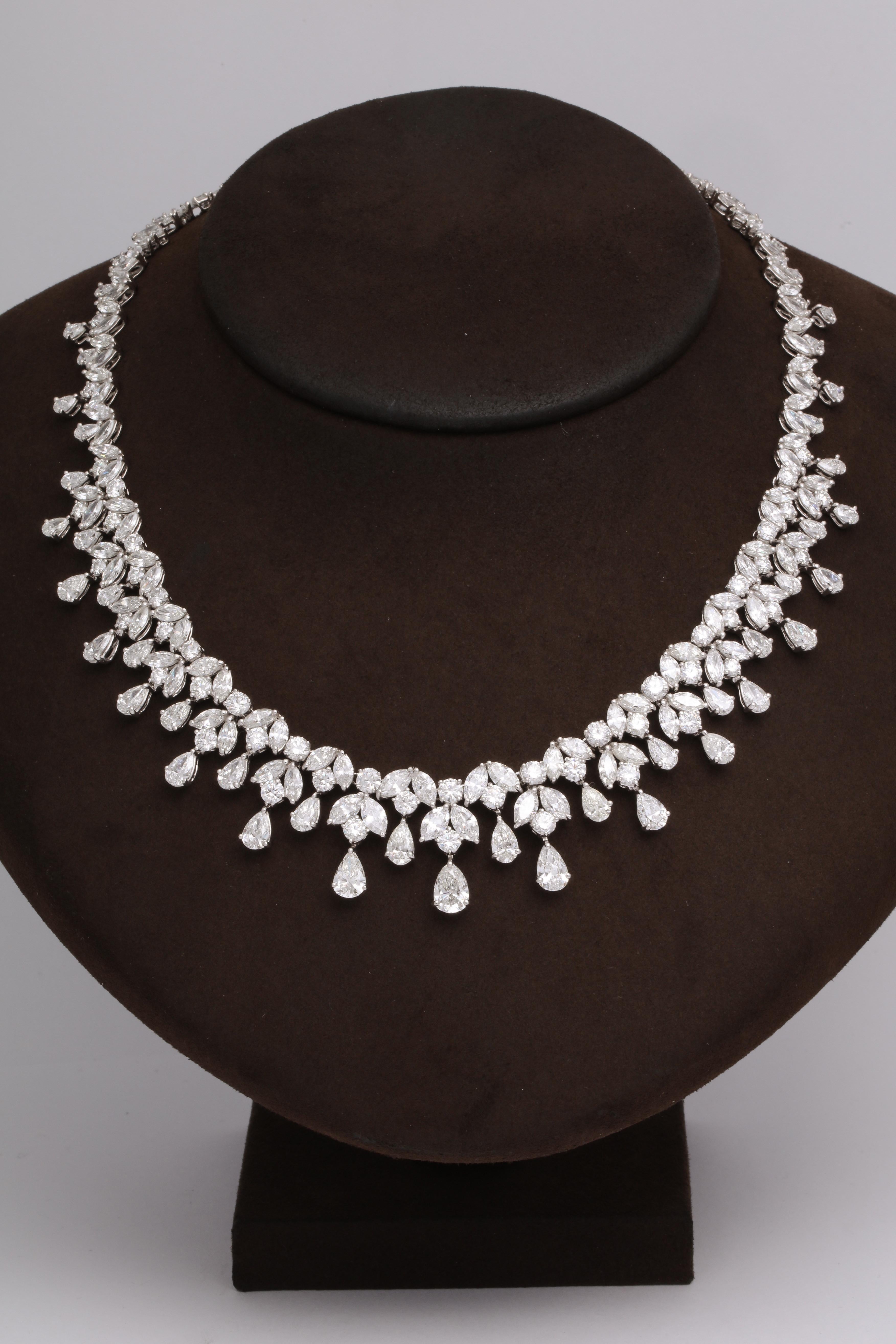 
One of our favorite designs, this necklace is SPECTACULAR!!

A timeless design featuring 48.28 carats of white pear, marquise and round cut diamonds set in platinum. 

A grand piece -- the perfect addition to any collection. 

16 inch length that