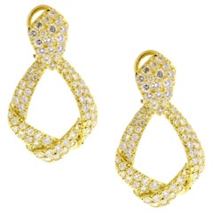 Boucles d'oreilles ruban avec goutte de diamant