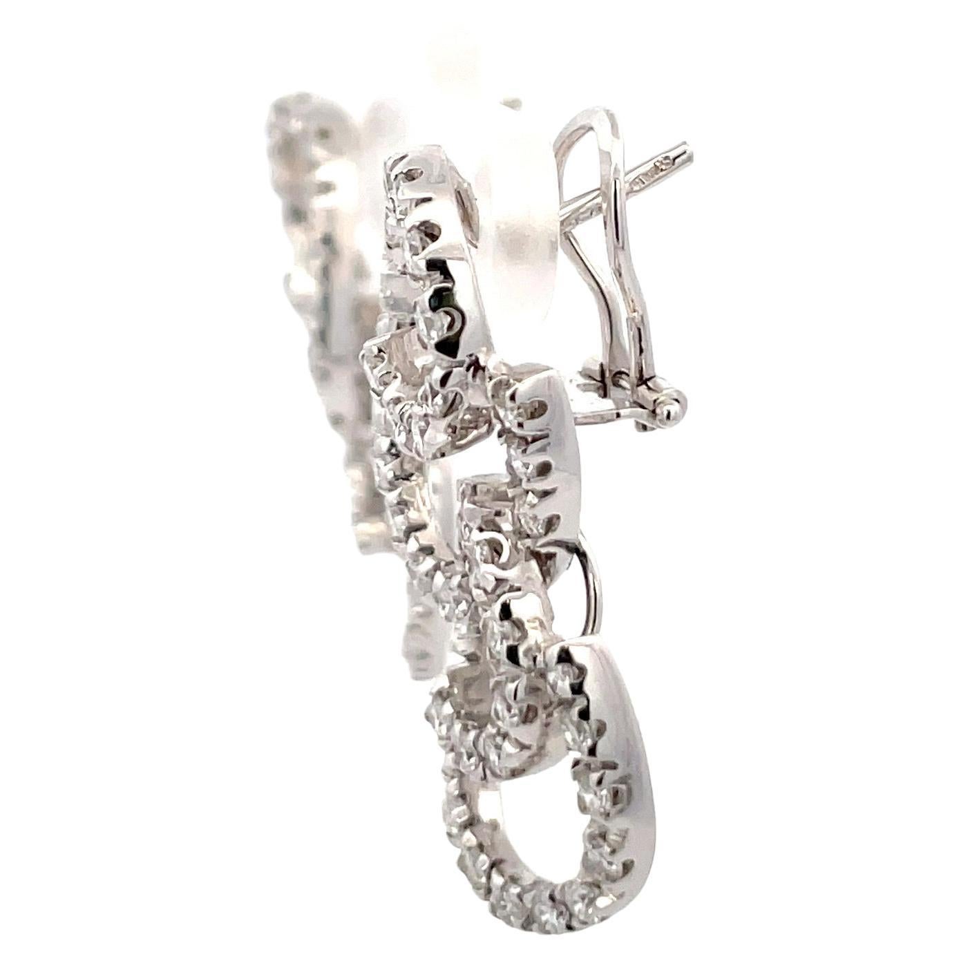 Contemporary Diamond Drop Swirl Earrings 2 Carats G VS2 18 Karat White Gold 12 Grams For Sale