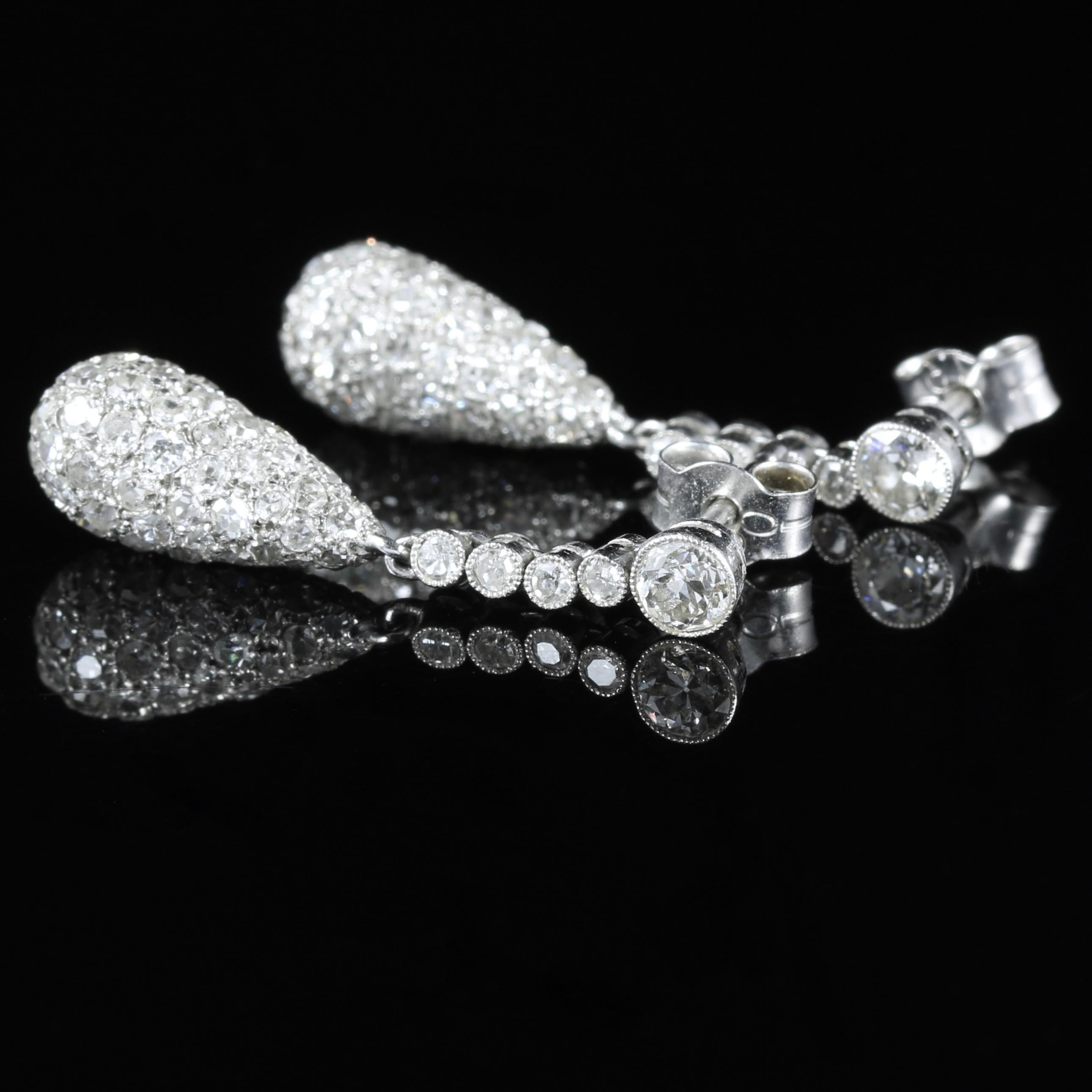 For more details please click continue reading down below...

These dropper earrings are set in 18ct White Gold.

Encrusted with over 7cts of old cut Diamonds, there are over 80 Diamonds in each earring. 

Diamonds sparkle continuously and