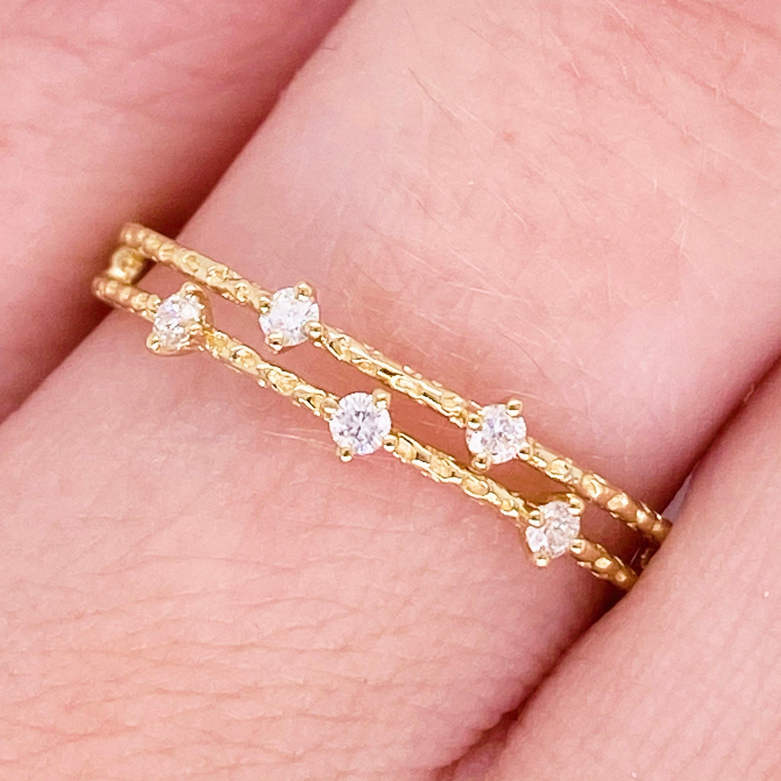 This lovely diamond band has two gorgeous detailed rows of diamonds! Accented by lovely 14 karat yellow gold, this ring is an amazing fashion band and stackable band!  This pairs well with most engagement rings and wedding bands as well!  Treat