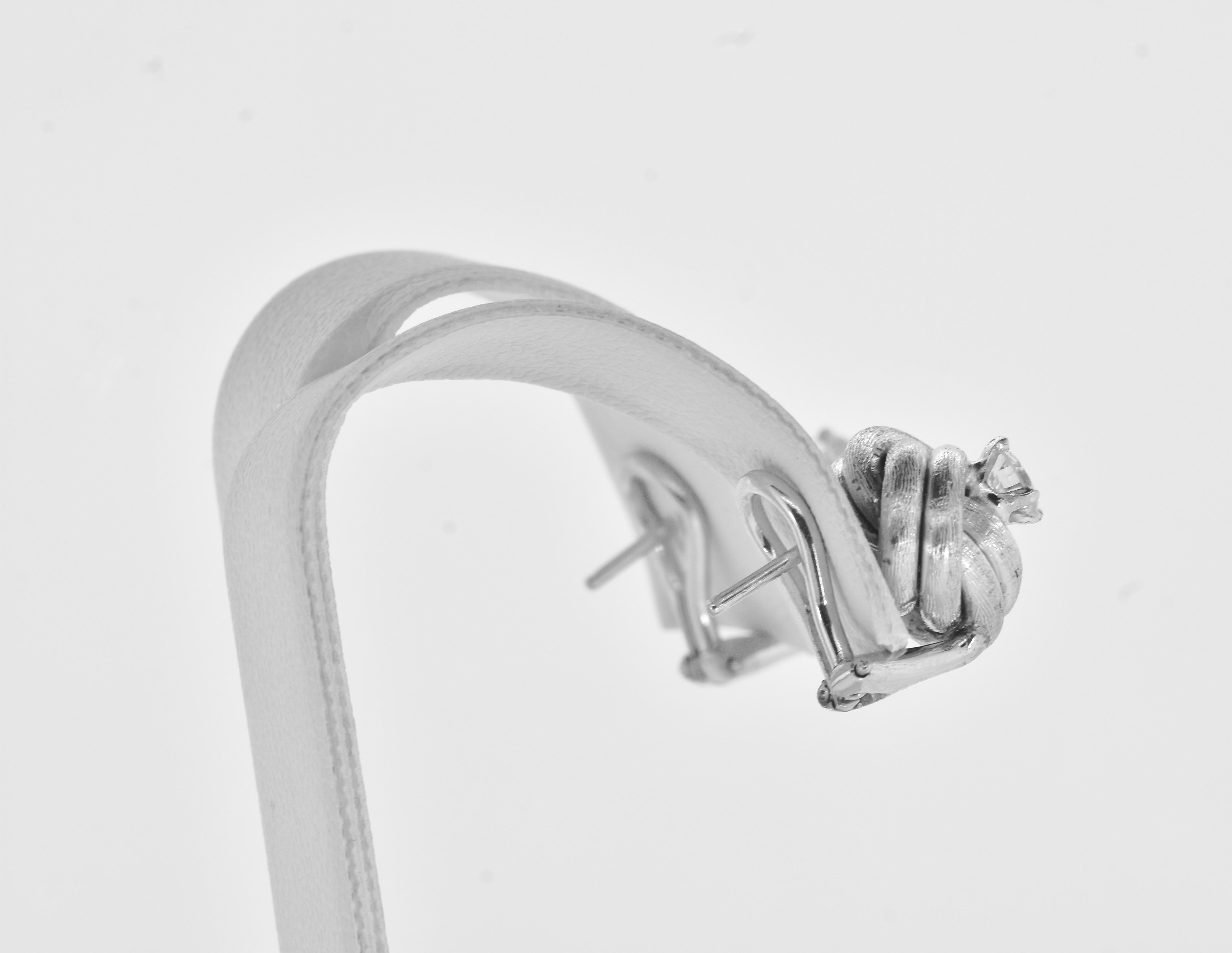 Women's or Men's Diamond Ear Stud White Gold Medium Size Earrings in a Love Knot Motif. For Sale
