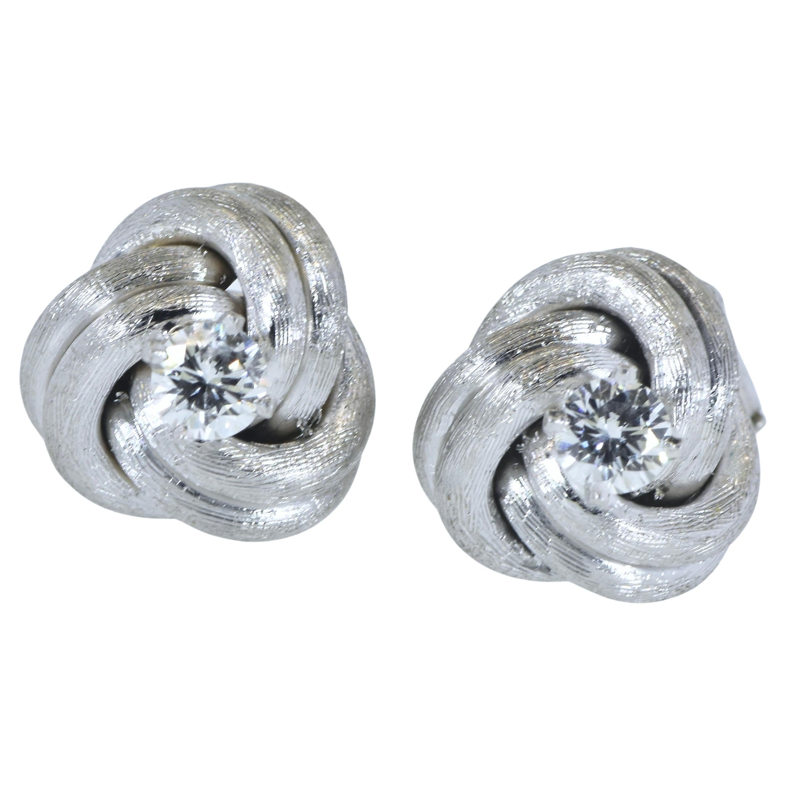 Diamond Ear Stud White Gold Medium Size Earrings in a Love Knot Motif. For Sale