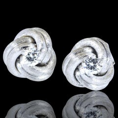 Diamond Ear Stud White Gold Medium Size Earrings in a Love Knot Motif.