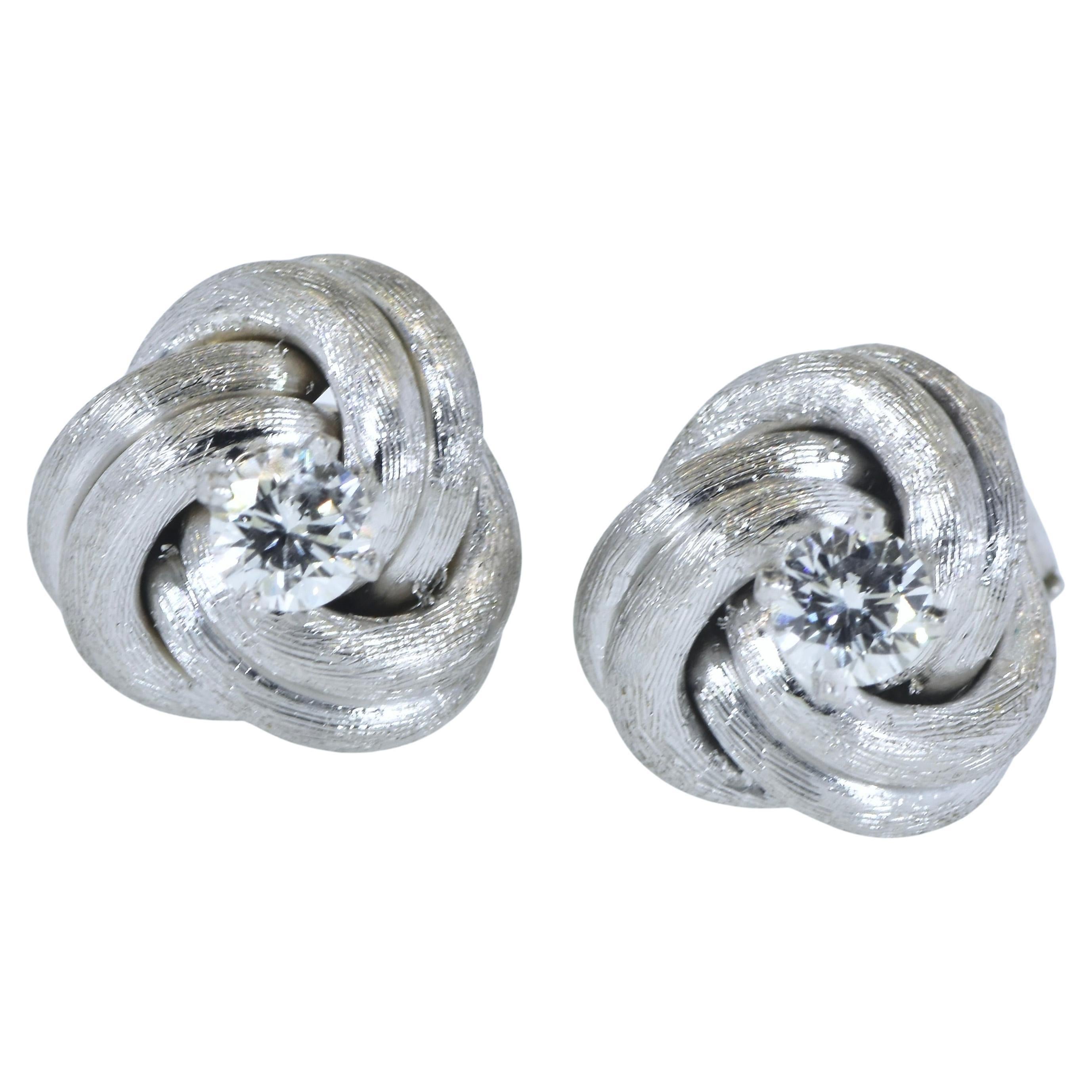 Diamond Ear Stud White Gold Medium Size Earrings in a Love Knot Motif. In Excellent Condition For Sale In Aspen, CO